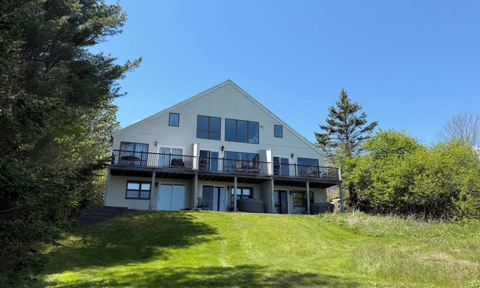 Southwest Harbor Condo | Enjoy the stunning ocean view from the hot tub!