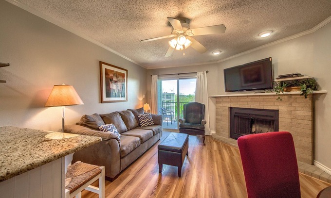 New Braunfels Condo | Located right on the Comal River! Pool, hot tub and direct river access!