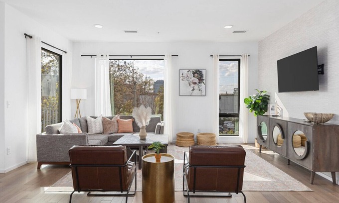 North Capitol Apartment | Luxury on the River - Walk to Downtown, 2 Private Patios & Garage Parking