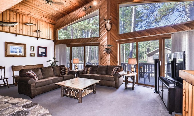 St Germain House | Spacious Northwoods cabin in lakeside resort with fireplace, personal dock, and