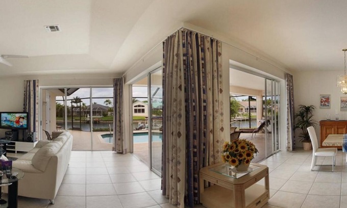 Pelican House | Spacious Waterfront w/Solar Heated Pool Home
