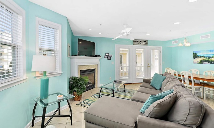 Midtown Ocean City House | Stylish, upscale 3 bedroom condo with a television in every bedroom and living room, free WiFi, and two floors located downtown only a few streets from the boardwalk and only steps to the beach!