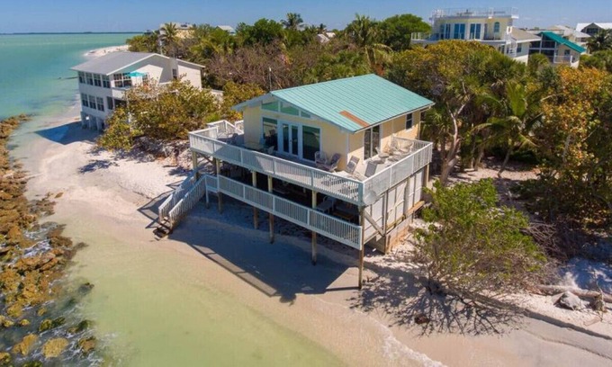 Jose's Hideaway House | Sunset Beach House: Pet Friendly Beach Front Home with Gorgeous Shaded Deck