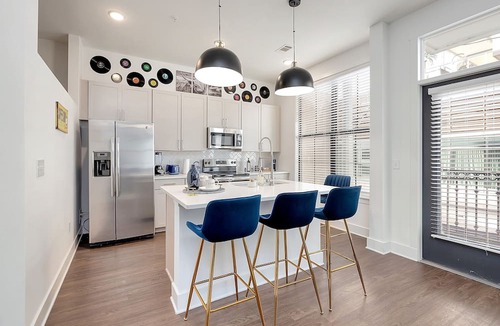 Rolling Mill Hill Apartment | Groovy Nashville: Parking, Pool, Gym, Terrace. So close to Broadway & Downtown!